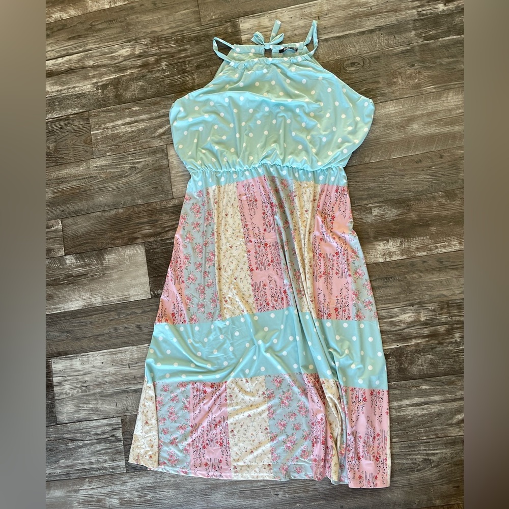 NWOT - Maxi dress with halter style top, and cinched empire waist.